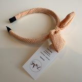 Gooiz | Haarband strik - ruit geel/roze