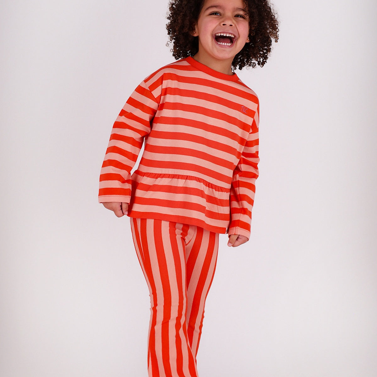 The New Chapter | flared pants Nena red pink stripes