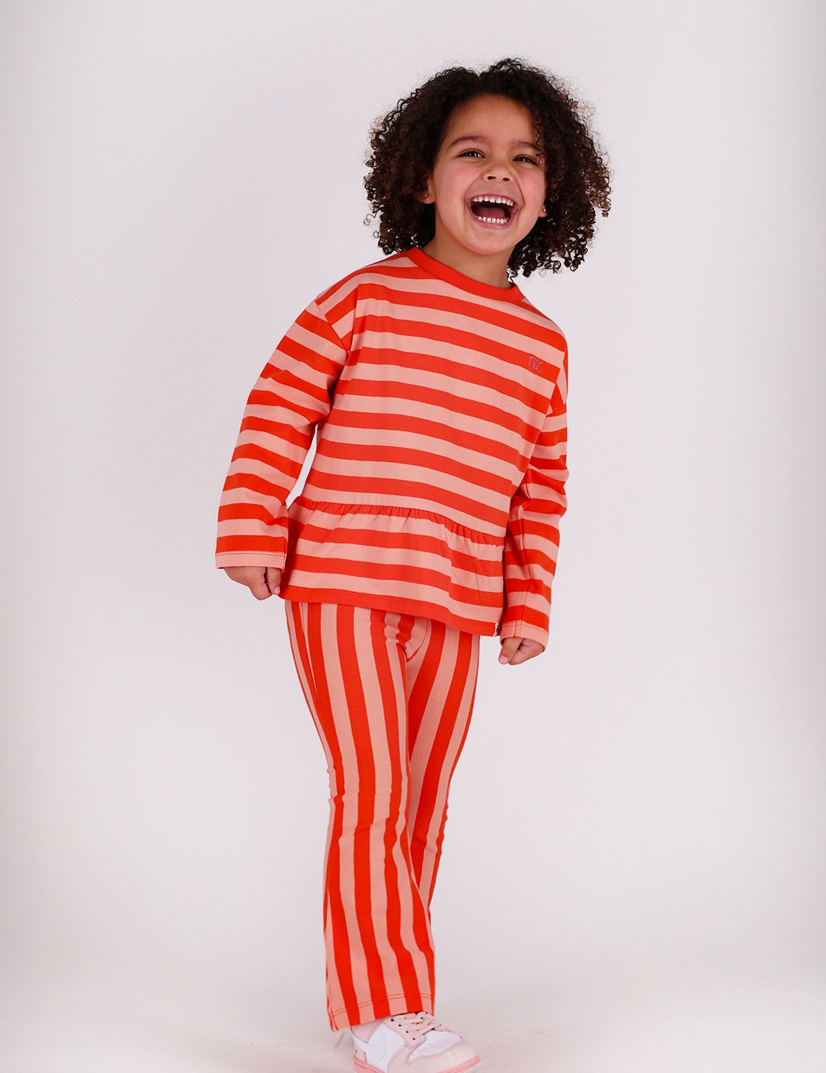 The New Chapter | flared pants Nena red pink stripes