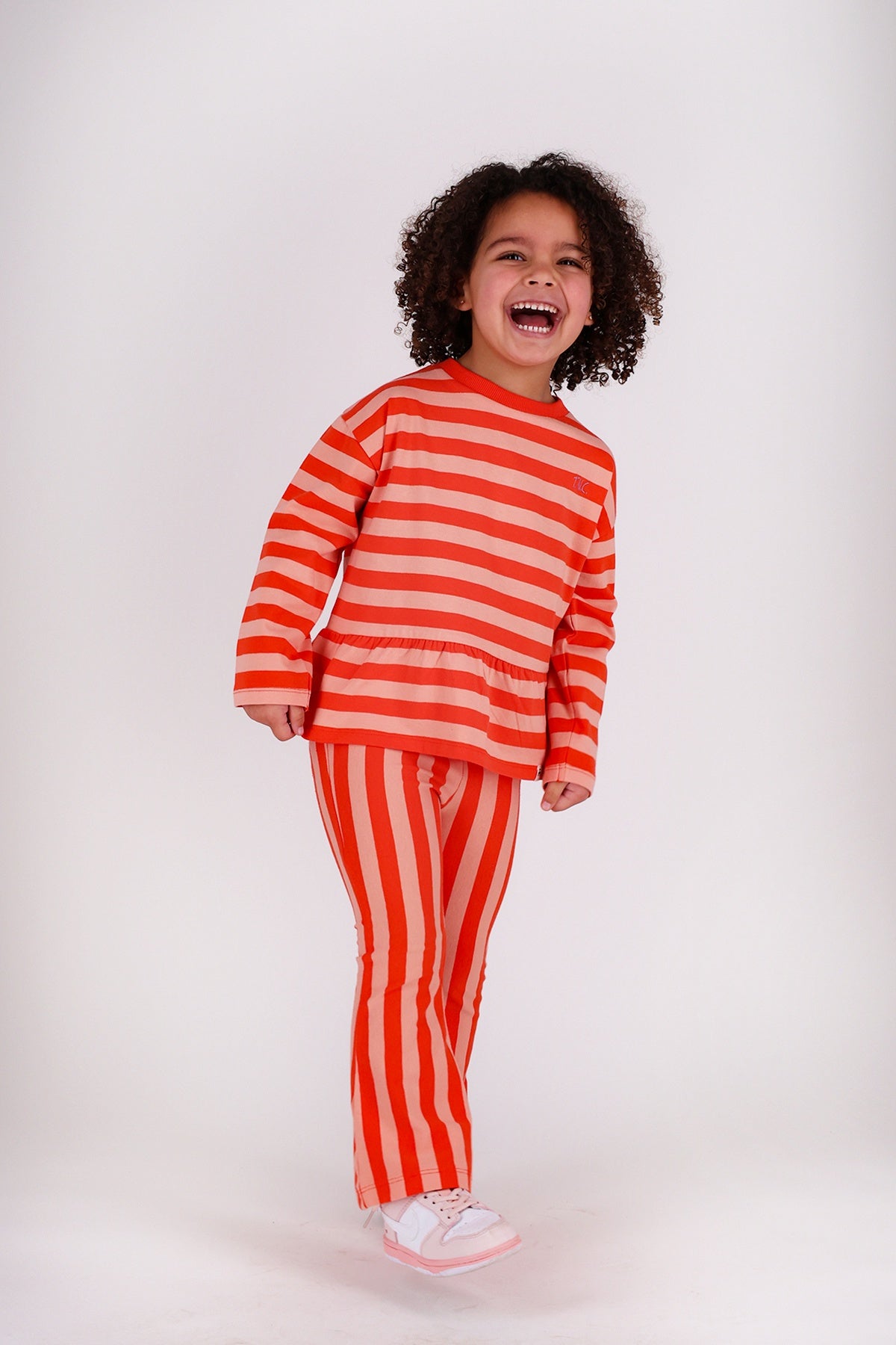 The New Chapter | flared pants Nena red pink stripes
